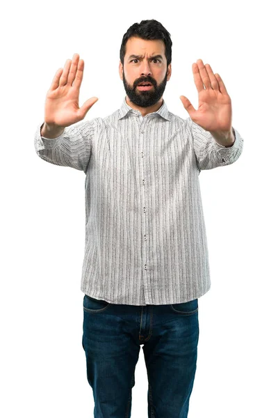 Handsome man with beard making stop gesture with her hand — Stock Photo, Image