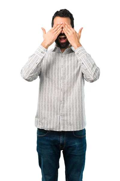 Hombre guapo con barba cubriendo los ojos con las manos — Foto de Stock