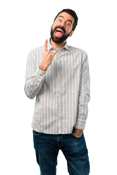 Jóképű férfi szakállal bemutatás nyelv, a kamera, amelynek funn — Stock Fotó