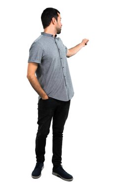 Yakışıklı adam işaret arka