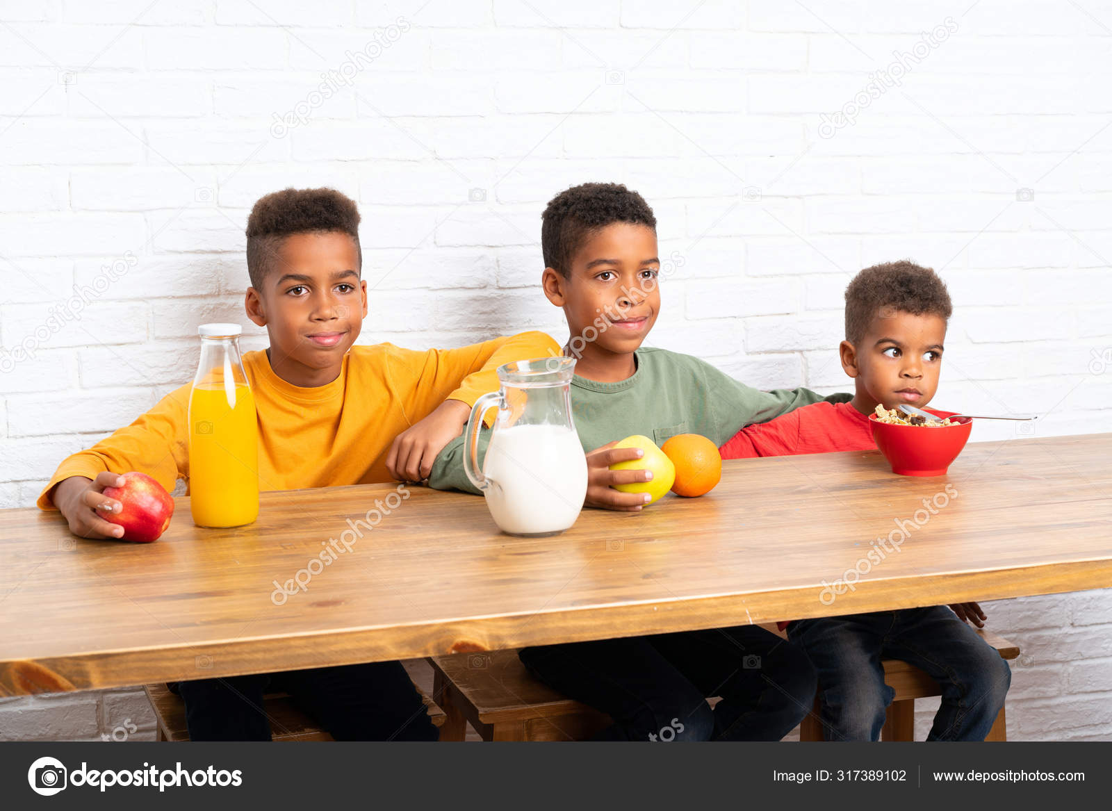 African American Brothers Having Breakfast — Stock Photo © luismolinero