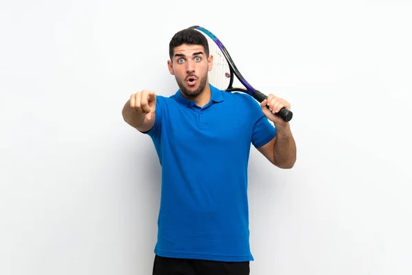 Handsome Young Tennis Player Man Isolated White Wall Surprised Pointing — ストック写真