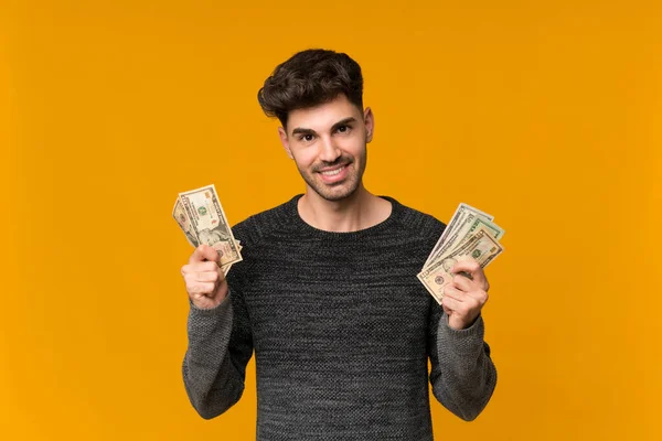 Young Man Isolated Background Taking Lot Money — 스톡 사진