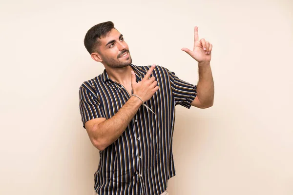 Beau Homme Avec Barbe Sur Fond Isolé Pointant Avec Index — Photo