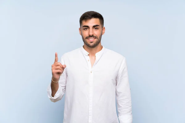 Bello Uomo Con Barba Sfondo Blu Isolato Che Mostra Solleva — Foto Stock