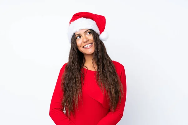 Chica Con Sombrero Navidad Sobre Fondo Blanco Aislado Riendo Mirando —  Fotos de Stock