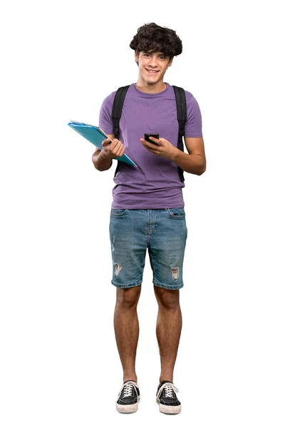 Полнометражный Снимок Молодого Студента Отправляющего Сообщение Мобильным Телефоном Изолированном Белом — стоковое фото
