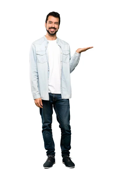 Full Length Shot Handsome Man Beard Holding Copyspace Imaginary Palm — Stock Photo, Image