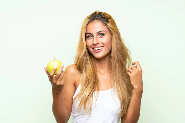 Giovane Donna Biondagiovane Donna Bionda Con Una Mela Sfondo Isolato — Foto Stock