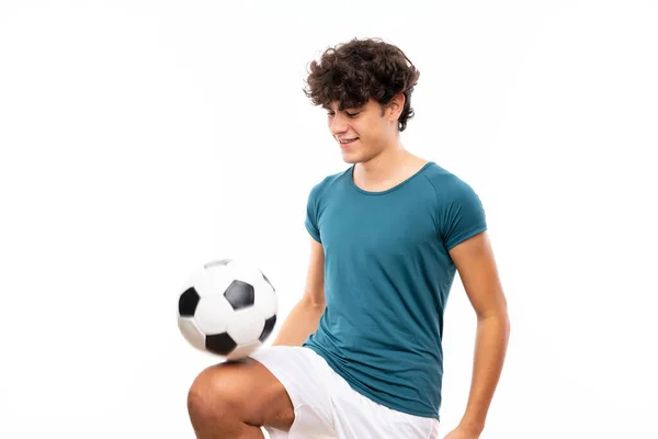 Tânăr Fotbalist Peste Zid Alb Izolat — Fotografie, imagine de stoc