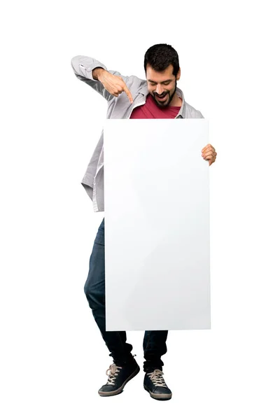 Tiro Completo Homem Bonito Com Barba Segurando Cartaz Vazio Sobre — Fotografia de Stock