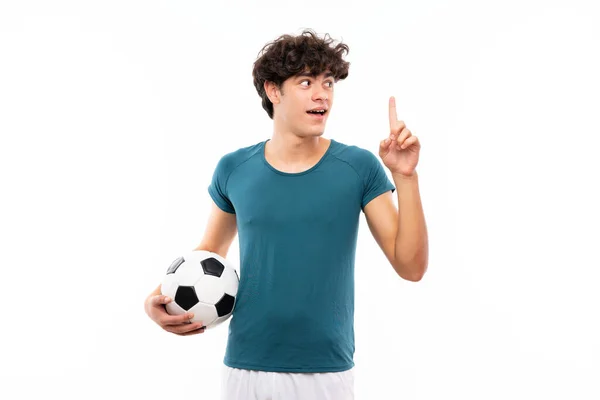 Jovem Jogador Futebol Homem Sobre Parede Branca Isolada Com Intenção — Fotografia de Stock