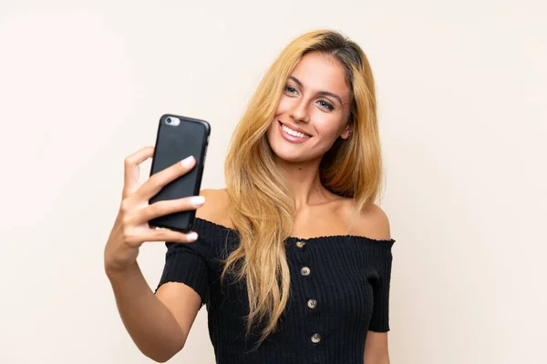 Young Blonde Woman Making Selfie Isolated Background — Stock Photo, Image
