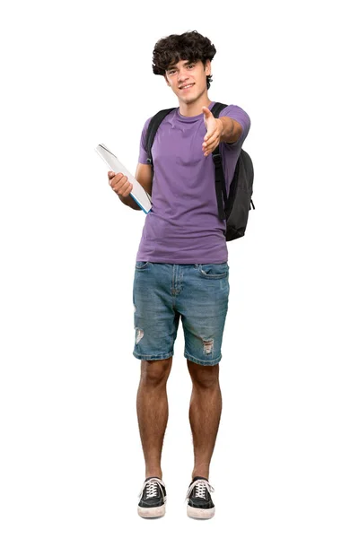 隔離された白い背景の上に良い取引を閉じるために手を振る若い学生の男のフル長いショット — ストック写真