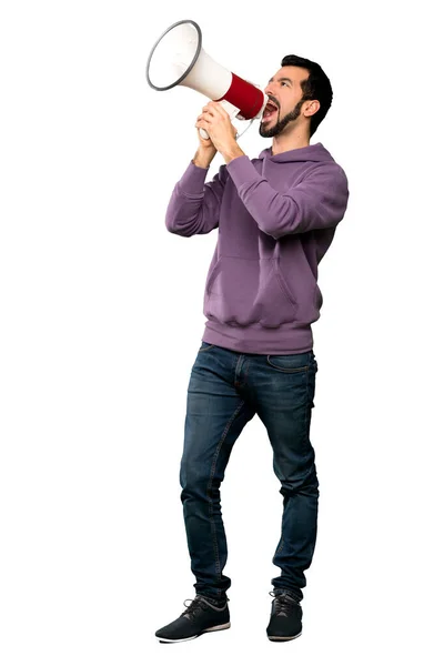 Tiro Completo Homem Bonito Com Camisola Gritando Através Megafone Sobre — Fotografia de Stock