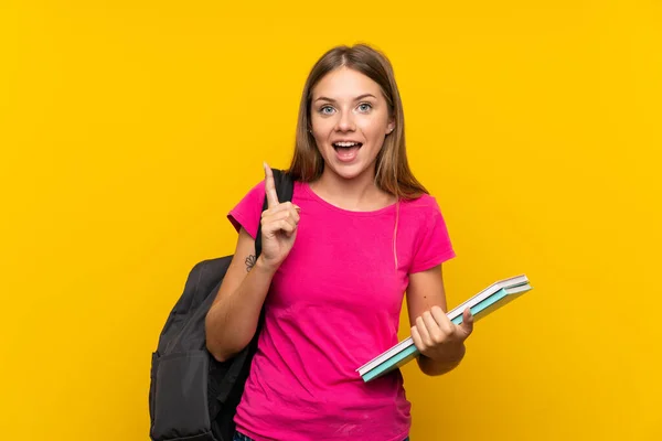 Junges Studentenmädchen Über Isoliertem Gelben Hintergrund Das Auf Eine Großartige — Stockfoto