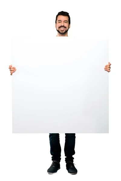 Boş Bir Afişini Izole Beyaz Arka Plan Üzerinde Tutarak Sakallı — Stok fotoğraf