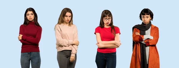 Conjunto Mujeres Sobre Fondo Azul Aislado Con Expresión Triste Deprimida —  Fotos de Stock