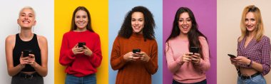 Renkli geçmişleri olan bir grup kadın cep telefonuyla mesaj gönderiyor.
