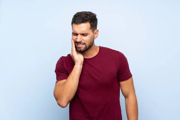 Hombre Guapo Sobre Fondo Azul Aislado Con Dolor Muelas — Foto de Stock