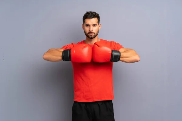 Young sport man with boxing gloves — Stock Photo, Image