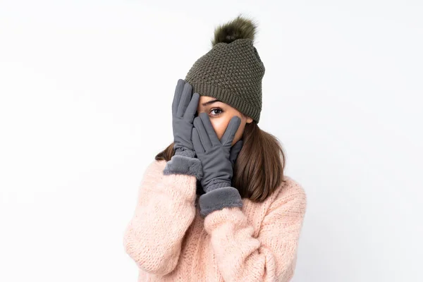 Young Girl Winter Hat Isolated White Background Covering Eyes Looking — Stockfoto