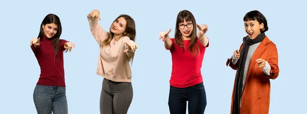 Uppsättning Kvinnor Över Isolerade Blå Bakgrund Pekar Finger Dig Medan — Stockfoto