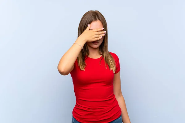 Teenager Girl Isolated Blue Background Covering Eyes Hands — Stock Photo, Image