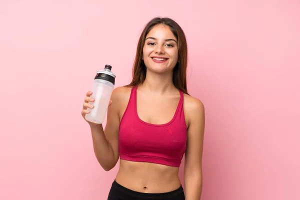 Junge Sportmädchen Über Isolierten Rosa Hintergrund Mit Sport Wasserflasche — Stockfoto