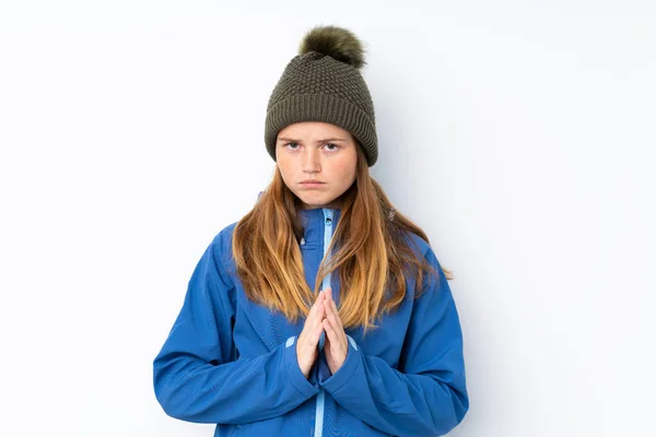 Adolescente Ucraniana Con Sombrero Invierno Sobre Fondo Blanco Aislado Suplicando —  Fotos de Stock