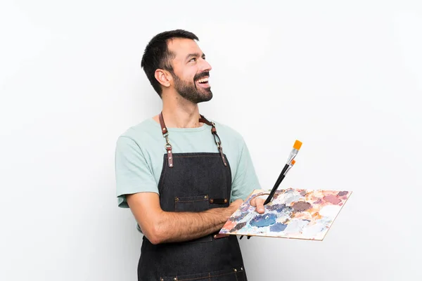 Jovem Artista Homem Segurando Uma Paleta Sobre Fundo Isolado Feliz — Fotografia de Stock