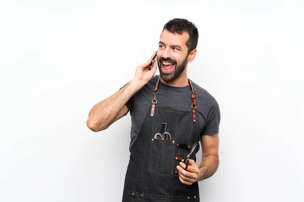 Homem Barbeiro Avental Mantendo Uma Conversa Com Telefone Celular — Fotografia de Stock