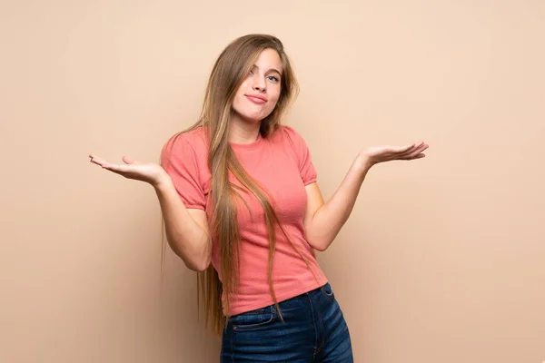 Teenager Blonde Girl Isolated Background Having Doubts Confuse Face Expression — Stock Photo, Image
