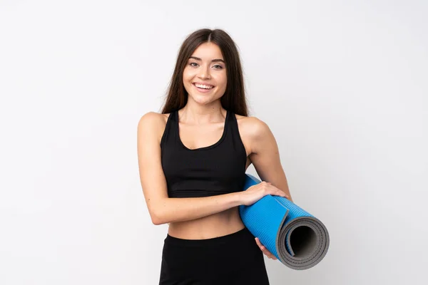 Mujer Deportiva Joven Sobre Fondo Blanco Aislado Con Una Estera — Foto de Stock