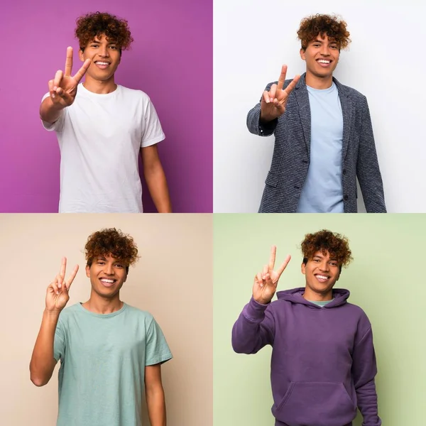 Conjunto Homem Afro Americano Sorrindo Mostrando Sinal Vitória — Fotografia de Stock