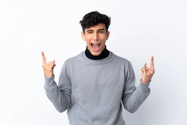 Jovem Argentino Homem Sobre Isolado Fundo Branco Fazendo Gesto Rock — Fotografia de Stock