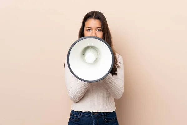 Young Colombian Girl Isolated Background Shouting Megaphone — Stock Photo, Image