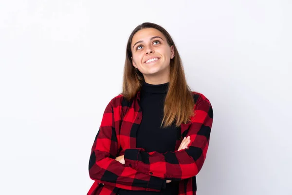 Tenåringsjente Med Isolert Hvit Bakgrunn Ser Opp Mens Hun Smiler – stockfoto