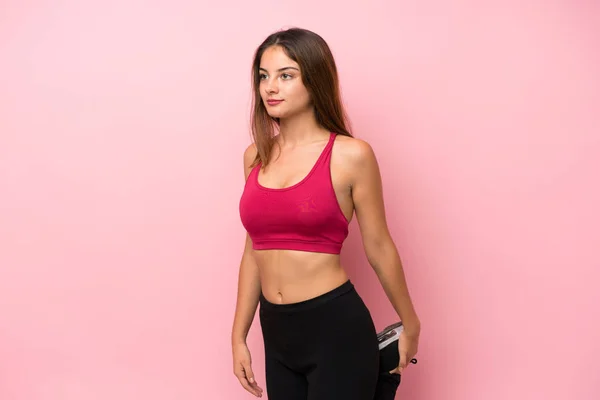 Jong Sport Meisje Geïsoleerde Roze Achtergrond Stretching Been — Stockfoto