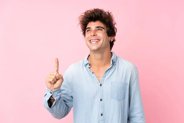 Joven Hombre Caucásico Con Camisa Jean Sobre Fondo Rosa Aislado —  Fotos de Stock