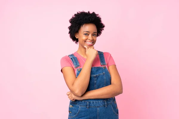 African American Woman Overalls Isolated Pink Background Laughing — стокове фото