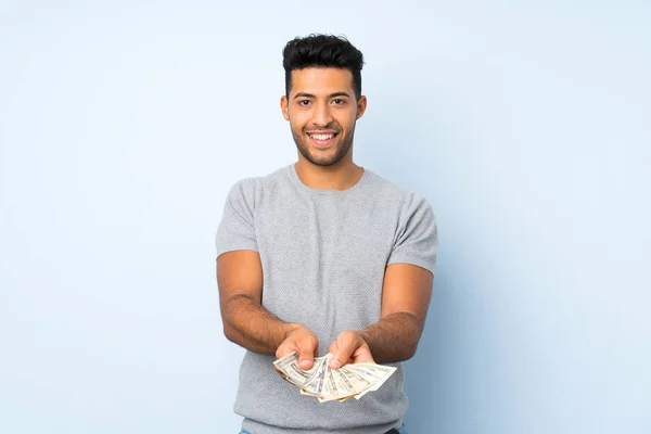 Jonge Knappe Man Geïsoleerde Achtergrond Het Nemen Van Een Heleboel — Stockfoto