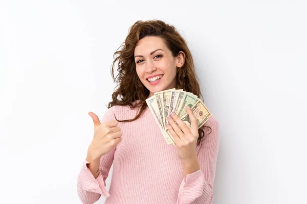 Joven Bonita Mujer Sobre Aislado Fondo Tomando Montón Dinero — Foto de Stock