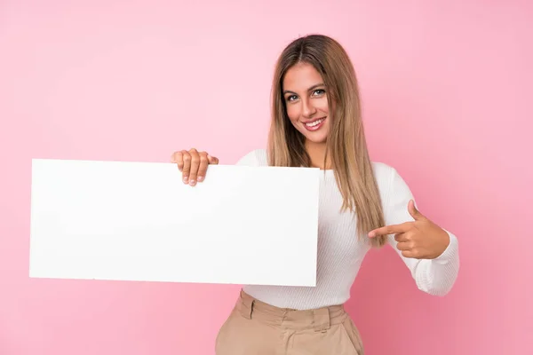 Young Blonde Woman Isolated Pink Background Holding Empty White Placard — 图库照片