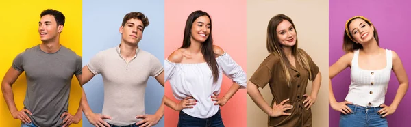 Conjunto Pessoas Sobre Fundo Colorido Posando Com Braços Quadril Sorrindo — Fotografia de Stock