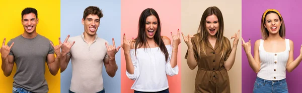 Ensemble Personnes Sur Fond Coloré Faisant Geste Rock — Photo