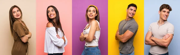 Conjunto Personas Sobre Fondo Colorido Con Los Brazos Cruzados Felices —  Fotos de Stock