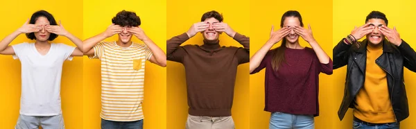 Set of people over isolated yellow background covering eyes by hands