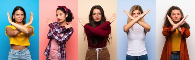 Rengarenk bir geçmişi olan bir grup kadın jest yapmıyor.