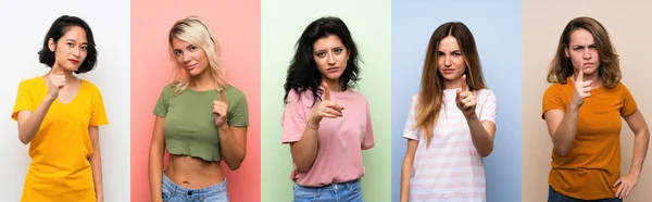 Uppsättning Kvinnor Över Isolerade Färgglada Bakgrund Frustrerad Och Pekar Framsidan — Stockfoto